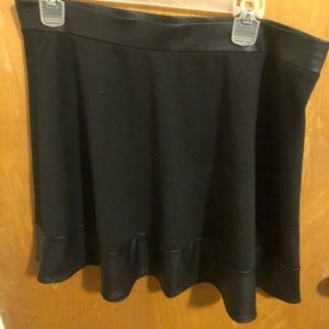 Black cotton pleather skirt.